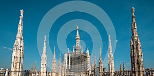 Milan Cathedral roof, Italy. Famous Milan Cathedral or Duomo di Milano is top landmark of city. Panoramic view of luxury spires