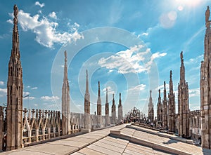 Milan Cathedral roof on sunny day, Italy. Milan Cathedral or Duomo di Milano is top tourist attraction of Milan