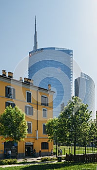 Juxtaposition of traditional Italian building and the Unicredit Building, one of the tallest in the city