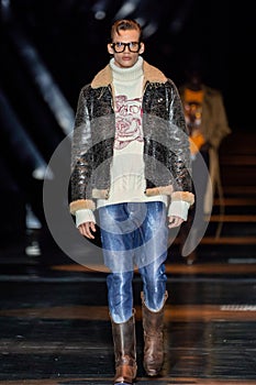 MILAN, ITALY - FEBRUARY 25: A model walks the runway at the Philipp Plein fashion show during the Milan Fashion Week