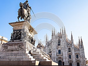 Tourist takes photo Monument in Milan in morning