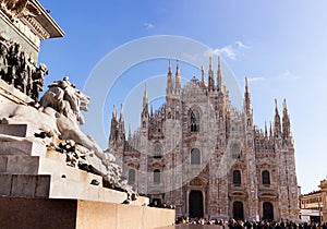 Lion sculpture and Milan Cathedral in Milan, Italy