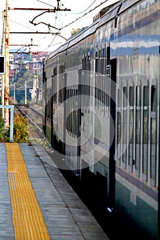 Milan, Italy - October 22, 2016: train passing at the Romolo railway station