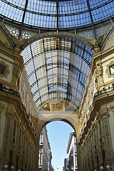 Milan, Italy, October 2021: Galleria Vittorio Emanuele II, an old shopping gallery, upwards view from inside the arcade.