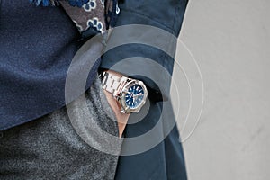 Man with Breitling watch with blue jacket before Fendi fashion show, Milan Fashion Week street style on