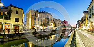Milan Navigli Milano restaurant and bar district travel traveling holidays vacation town blue hour panorama in Italy