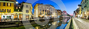 Milan Navigli Milano restaurant and bar district travel traveling holidays vacation town blue hour panorama in Italy photo