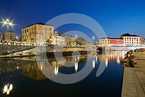 Milan new Darsena, redeveloped docks area in the night, people photo