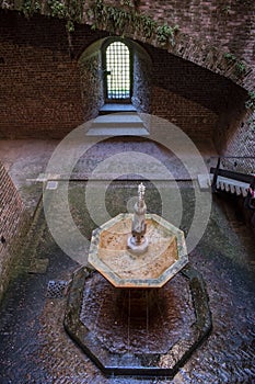 Milan, Italy, Europe, Sforza Castle, Castello Sforzesco, museum, courtyard, Cortile della Fontana, court, fountain, bricks photo