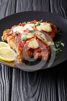 Milanesa a la napolitana - veal cutlet with mozzarella cheese an