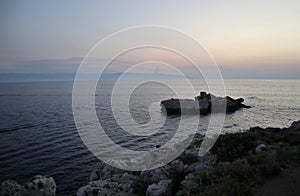 Milazzo - Scoglio della Portella a Capo Milazzo dopo il tramonto photo