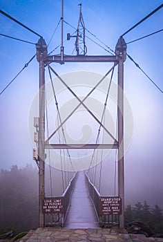 The Mile-High Swinging Bridge in fog, at Grandfather Mountain, N