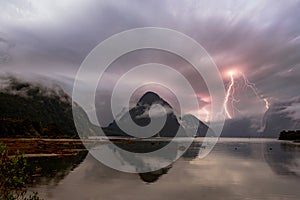 Milford Sound lightening storm known for towering Mitre Peak, plus rainforests and waterfalls