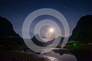 Milford sound at night with startrail