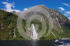 Milford Sound waterfall, South island, New Zealand.