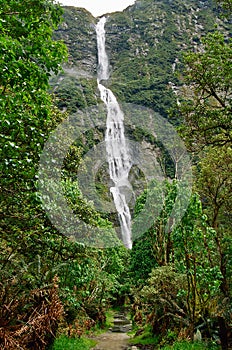 Milford Track waterfall, New Zealand photo