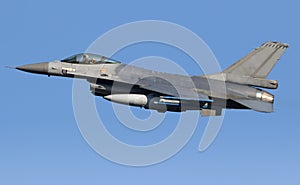 Military air force fighter jet interceptor airplane in full flight