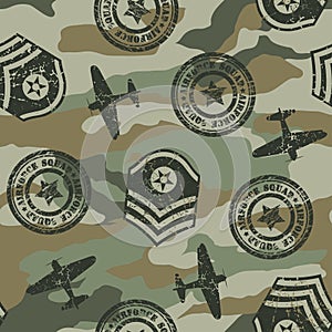 Military badges in a seamless pattern