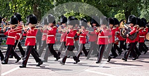 Military band belonging to the Coldstream Guards marching down The Mall during the Trooping the Colour military parade, London UK