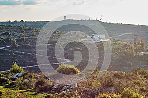 Military base at the mountain at sunset time, Israel, Samaria.