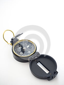 Military black compass isolated on white