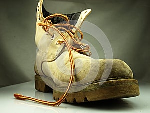 Military boot. Old heavy and destroyed.