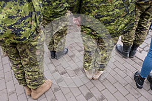 Military in camouflage. Warrior clothes.