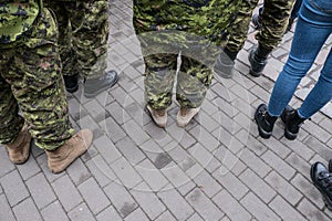 Military in camouflage. Warrior clothes.