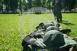 Military camp. Helmets in a row