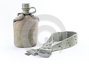 Military canteen and army belt on white background