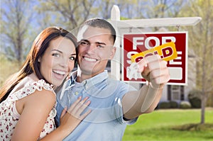 Military Couple In Front of Home, House Keys and Sign