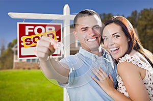 Military Couple In Front of Home, House Keys and Sign