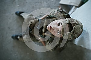 Military female soldier having a break