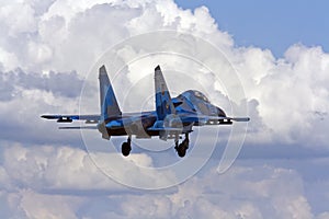 Military fighter su-27 Flanker on blue sky