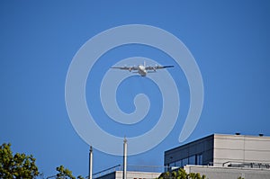 Military Four Helix Aircraft Flying in Low Altitude