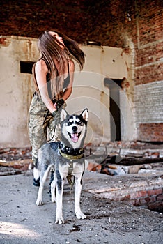 Military girl with dog husky