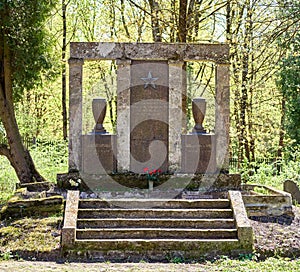 Military gravestone with the Soviet symbols at Rainis Cemetery in Riga