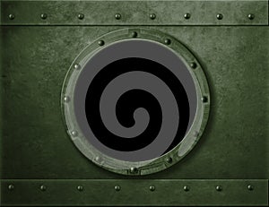 Military green armoured porthole or window metal background