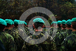 Military green Beret parade, fatigues