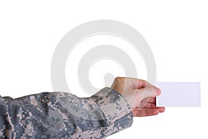 Military hand holding business card