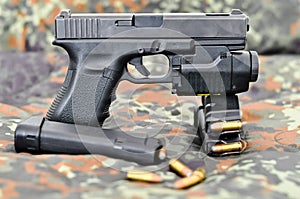 Military handgun with laser/light-module