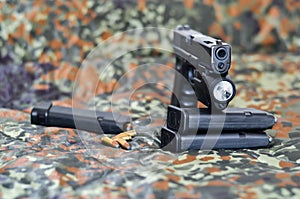 Military handgun with laser/light-module