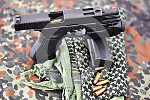 Military handgun with laser/light-module photo