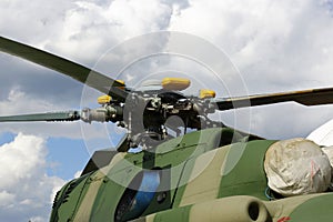 A military helicopter, the blades of a helicopter. case engine helicopters turbine