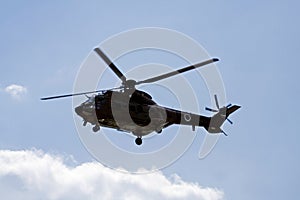 Military helicopter in flight