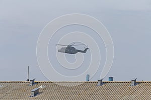 Military helicopter in flight