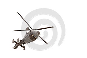 Military helicopter in flight, isolated on white