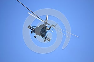 Military helicopter flying front view