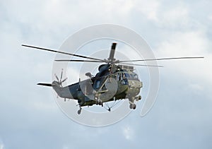 Military Helicopter Hovering photo