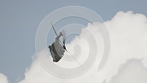 military helicopter performing combat flight maneuvers